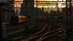 Sunset buildings cities railroad tracks trains