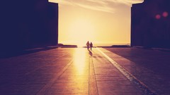 Sunset buildings holding hands