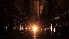 Sunset cars streets new york city sun flare