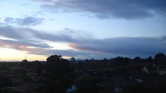 Sunset clouds cities skies