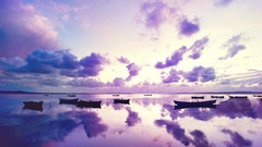 Sunset clouds ocean purple Boats