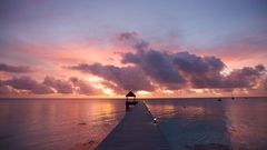 Sunset clouds piers Sea