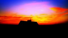 Sunset colors silhouettes houses skies