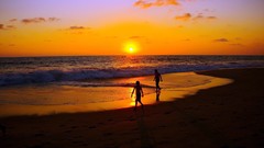 Sunset couple Beaches