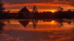 Sunset fire clouds houses hungary Székesfehérvár