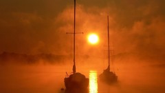 Sunset fog ships mist