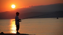 Sunset hills fishing boy