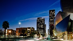 Sunset lights buildings streets cityscapes