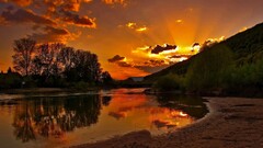 sunset nature sunlight water Trees landscape clouds sky