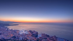 Sunset ocean City Lights buildings cityscapes