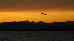 Sunset plane orange sky