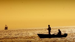 Sunset Sea fishing Boats silhouettes