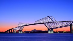 Sunset Sea hills lights Cranes Bridges architecture