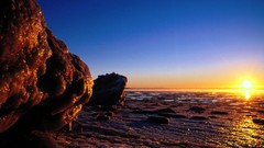Sunset Sea rocks Beaches