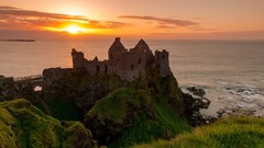 Sunset Sea ruins Castles Ulster