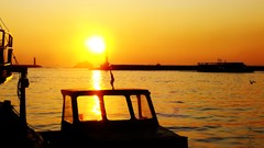 Sunset Sea ships reflections