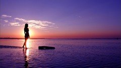 Sunset Sea woman silhouettes