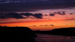 Sunset silhouettes lakes