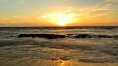 Sunset sun clouds Beaches waves skies