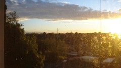 Sunset sun clouds cities skies