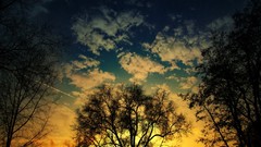 Sunset sun clouds light skies