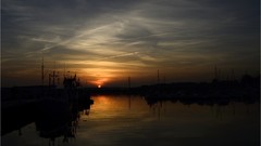 Sunset water clouds skies