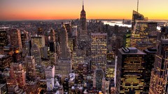 Sunset water lights cars Empire State Building cities rivers 