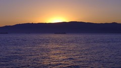 Sunset water sun blue ocean