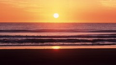 Sunset waves Beaches