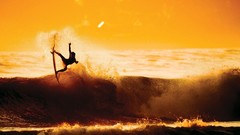 Sunset waves surfers