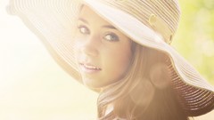 Sunset woman hats faces blondes