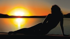 Sunset woman silhouettes lakes shadows