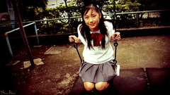 Swings asians knees together