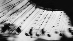 Swings grayscale old photography funfair Ernst Haas