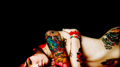 Tattoos woman black background