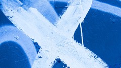 Textures blue white paint abstract metal cross