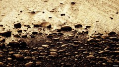 Textures nature water sun black evening sepia pebbles rocks 