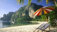 Thailand beach umbrella mountain