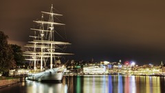 Trees night water sky Skyscrapers Sailboats City Lights 
