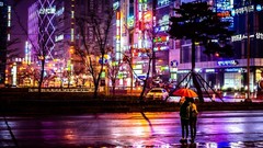 Trees rain cars Umbrellas Asia buildings vehicles cityscapes 