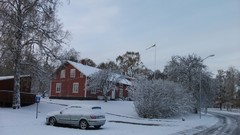 Trees snow winter cars houses