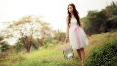 Trees woman cage outdoors asians Bunnies brunettes white dress 