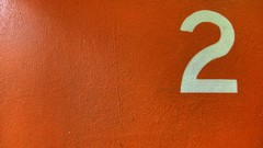 Two numbers orange background