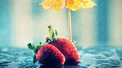 Umbrellas strawberries fruits water drops