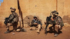 Wall War Army fight soldiers French military Africa sitting 