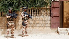 Wall War Army soldiers French military Africa houses guard 