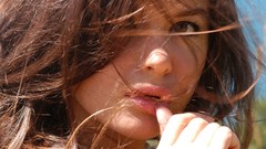 Wall woman faces brunettes