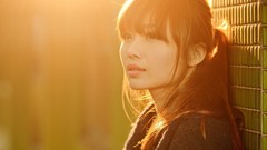 Wall woman Japanese asians sunlight long hair brunettes bangs 