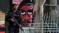 War graffiti weapons Guns police santa slum Rio de Janeiro 
