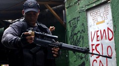 War graffiti weapons Guns police slum Rio de Janeiro Brazil 